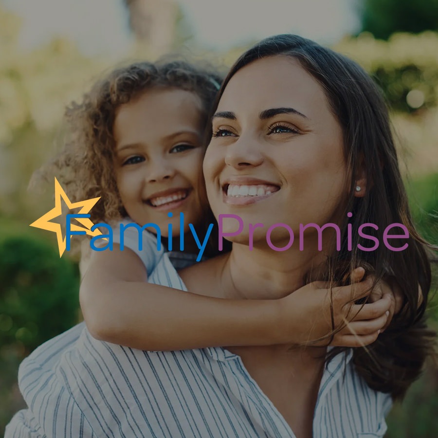 Family Promise families and children smiling outdoors
