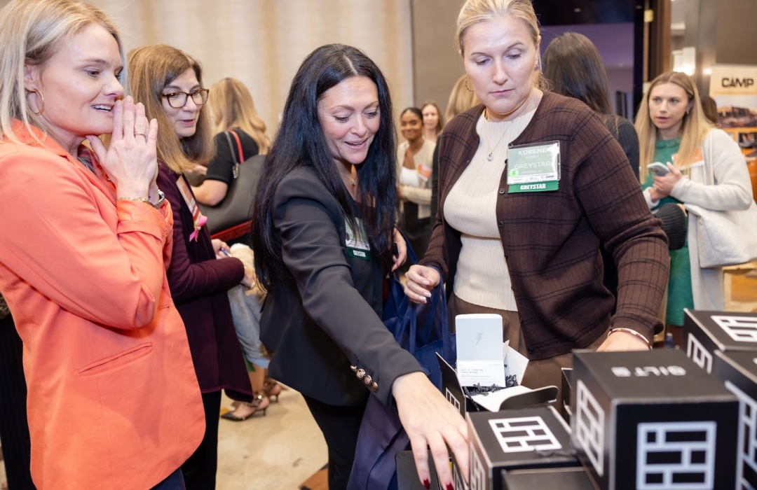 image of women interacting at a trade show