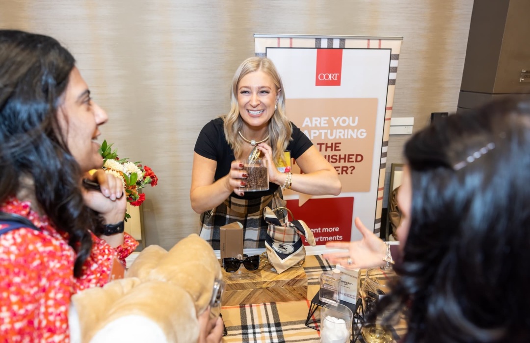 image of women interacting at a trade show