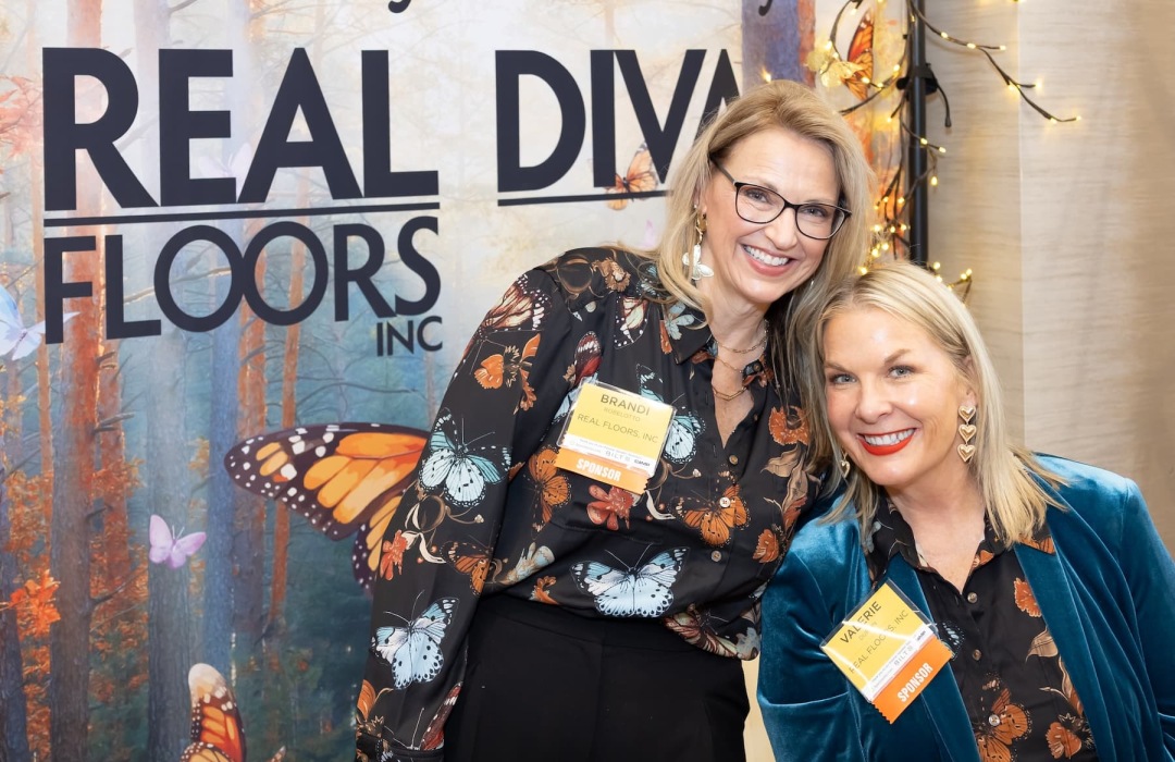 people posing at a tradeshow