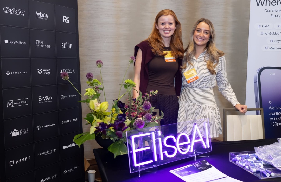 people posing at a tradeshow