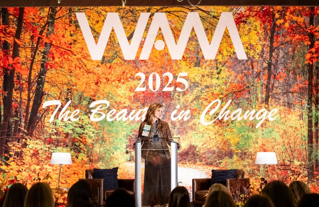 image of women indoors at a multifamily conference for empowering women