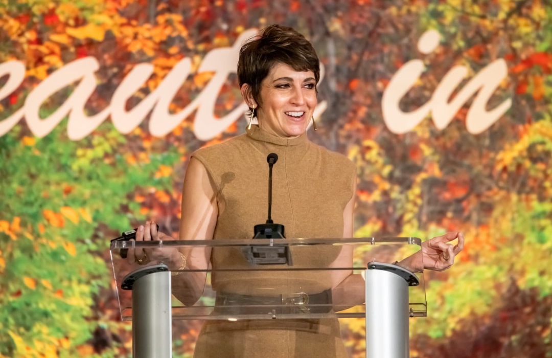 image of women indoors at a multifamily conference for empowering women