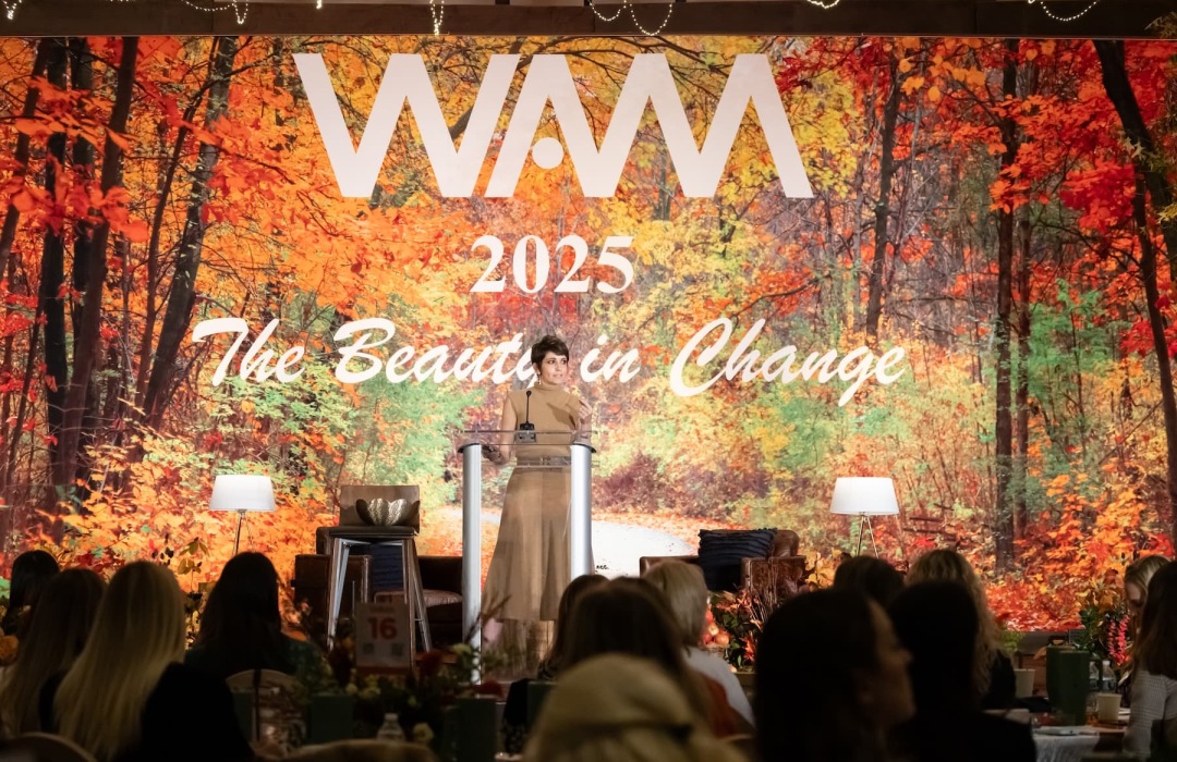 image of women indoors at a multifamily conference for empowering women