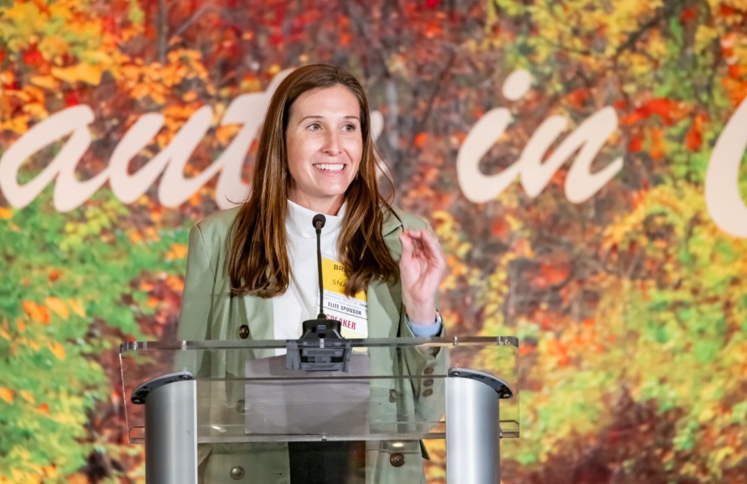 image of women indoors at a multifamily women's conference