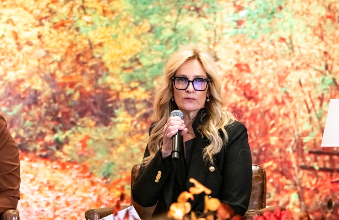 image of women indoors at a multifamily women's conference