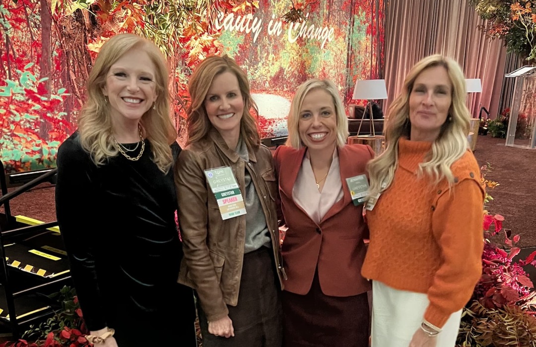 images of women posing at a conference