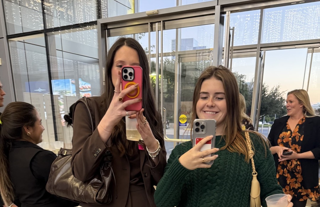 images of women posing at a conference